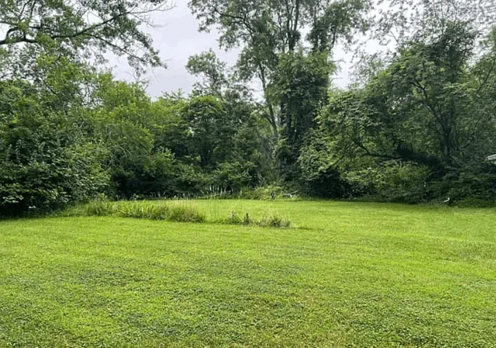 Another exterior view of the purchased Clarksburg property.