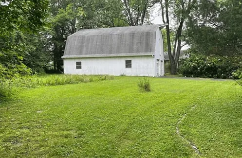Additional exterior view of the purchased Clarksburg property.